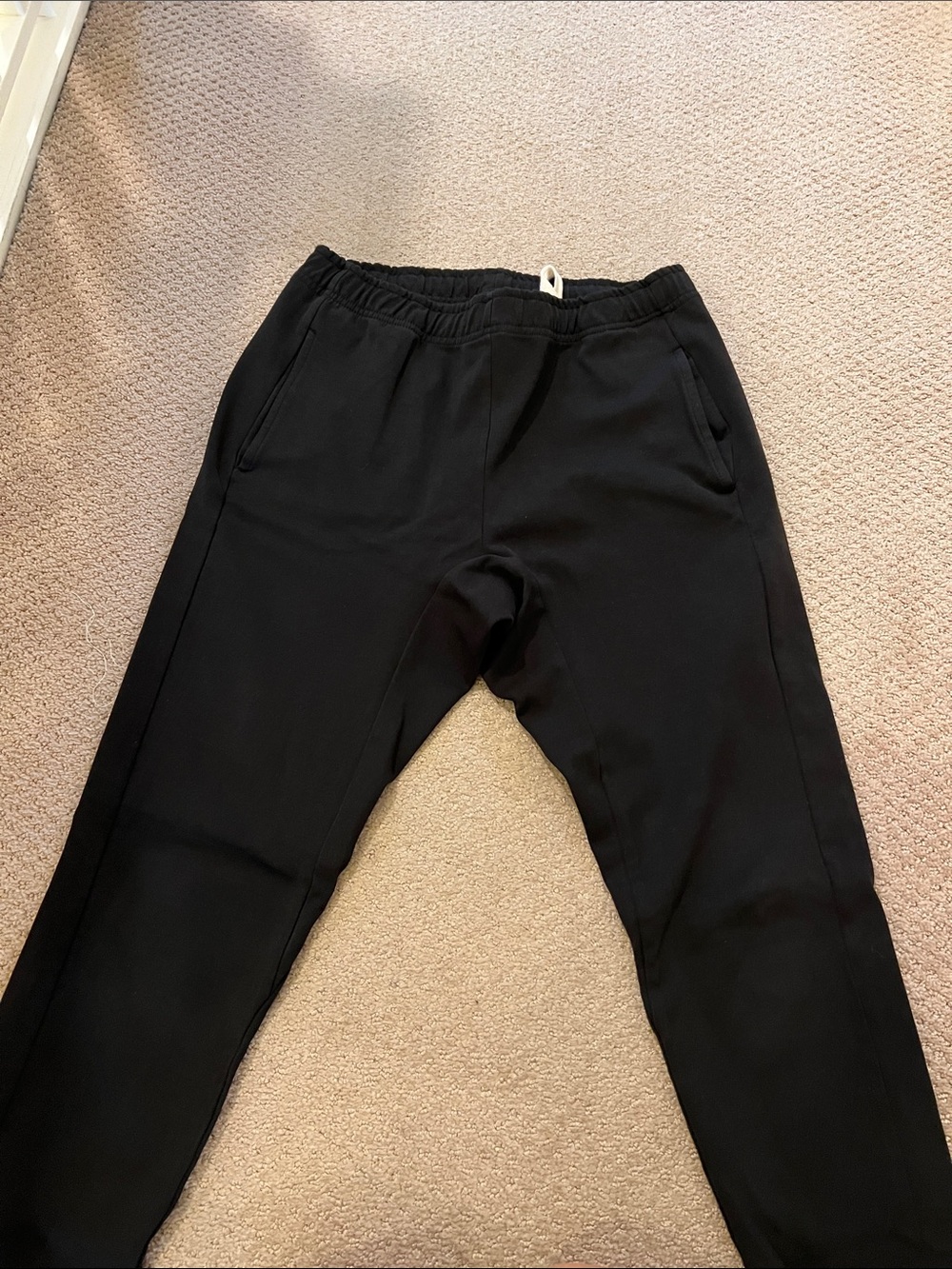 Women’s Black Elastic Waist Jac + Jack drop crotch pants with pockets.